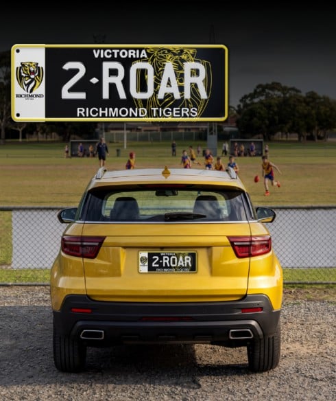 A car with an AFL Premium style plate